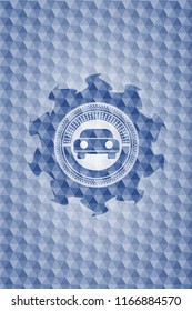 car seen from front icon inside blue badge with geometric pattern.