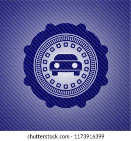 car seen from front icon inside badge with denim texture