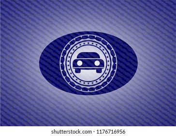 car seen from front icon inside emblem with jean background