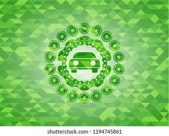 car seen from front icon inside realistic green mosaic emblem