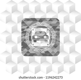 car seen from front icon inside retro style grey emblem with geometric cube white background