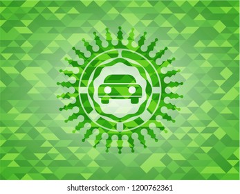 car seen from front icon inside realistic green emblem. Mosaic background