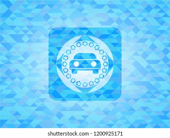 car seen from front icon inside realistic light blue emblem. Mosaic background