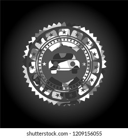 car seen from front icon inside grey camouflaged emblem
