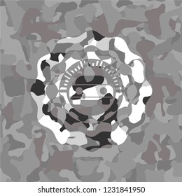 car seen from front icon inside grey camouflage emblem