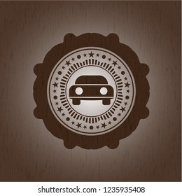 car seen from front icon inside wooden emblem. Vintage.