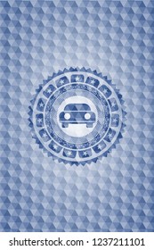 car seen from front icon inside blue emblem or badge with abstract geometric pattern background.