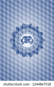 car seen from front icon inside blue emblem with geometric background.