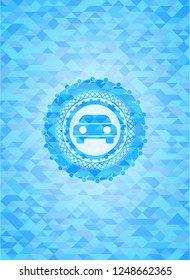 car seen from front icon inside light blue mosaic emblem
