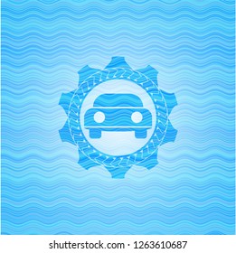 car seen from front icon inside light blue water emblem.