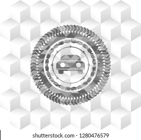 car seen from front icon inside grey badge with geometric cube white background