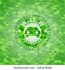car seen from front icon inside green emblem with mosaic ecological style background