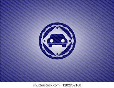 car seen from front icon inside badge with denim texture