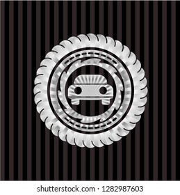 car seen from front icon inside silver badge or emblem