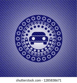 car seen from front icon inside emblem with jean texture