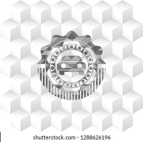 car seen from front icon inside grey badge with geometric cube white background