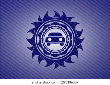 car seen from front icon inside emblem with jean background