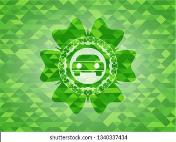 car seen from front icon inside green mosaic emblem