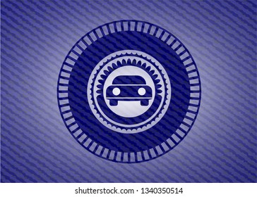 car seen from front icon inside badge with denim background