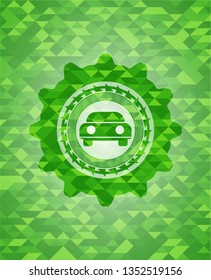 car seen from front icon inside green mosaic emblem