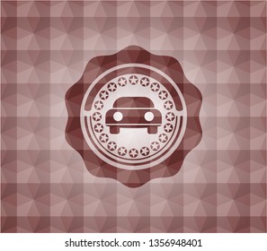 car seen from front icon inside red seamless emblem or badge with geometric pattern background.