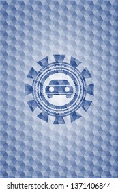 car seen from front icon inside blue polygonal emblem.