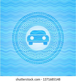 car seen from front icon inside water wave representation style emblem.