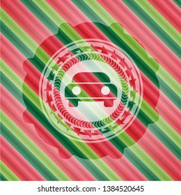 car seen from front icon inside christmas colors emblem.
