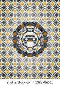 car seen from front icon inside arabic badge. Arabesque decoration.