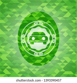 car seen from front icon inside green emblem with mosaic ecological style background