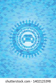 car seen from front icon inside sky blue emblem. Mosaic background