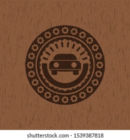 car seen from front icon inside wood emblem. Retro