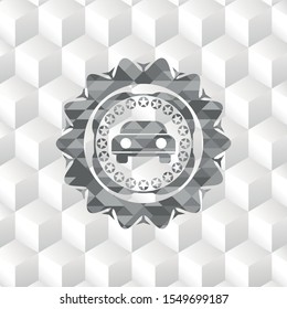 car seen from front icon inside grey badge with geometric cube white background