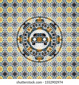 car seen from front icon inside arabic style badge. Arabesque decoration.