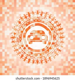 car seen from front icon inside abstract emblem, orange mosaic background. 