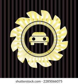 car seen from front icon inside gold emblem or badge. 