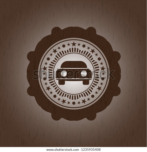 car\
seen from front icon inside wooden emblem.\
Vintage.