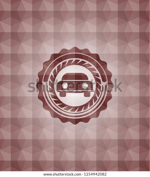 car seen from front icon inside red seamless\
emblem with geometric\
pattern.