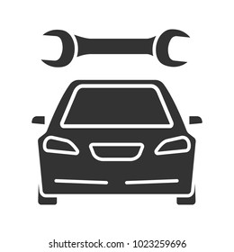 Car with spanner glyph icon. Auto workshop. Repair service. Silhouette symbol. Negative space. Vector isolated illustration