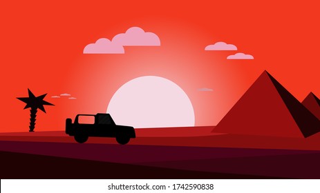 Car travelling through desert to pyramids