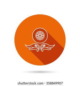 Car wheel icon. Fire flame symbol. Round orange web button with shadow.