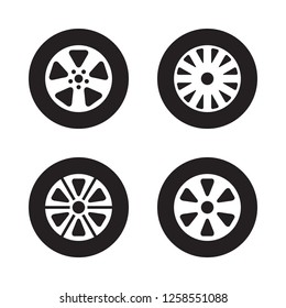 Car wheel set, tire icons, black isolated on white background, vector illustration.