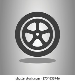 Car wheel simple icon with shadow. Flat desing