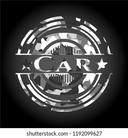 Car written on a grey camouflage texture