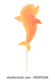 Caramel candy on a stick in the form of sea creatures dolphin. For children on holidays.
