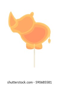 Caramel candy on a stick in the form of rhinoceros. Delicious sweet snack for kids.


