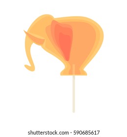 Caramel candy on a stick in the form of elephant. Festive sweet snack for children on holidays.