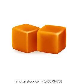 Caramel cubes toffee on a white background. 