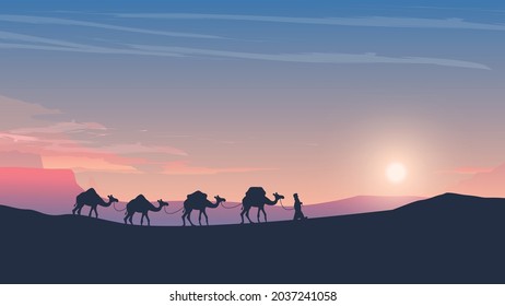 caravan of camels at sunset arabic desert