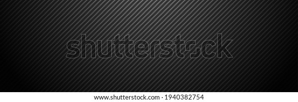 Carbon\
background wide. Realistic fiber texture. Dark futuristic backdrop\
with shadow. Metal cells design. Black composite material. Modern\
technology wallpaper. Vector\
illustration.